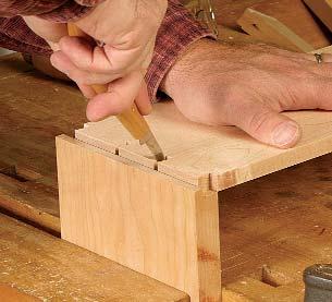 Then pare to the scribe line with a sharp chisel (4). After assembly, use a shoulder plane to trim the pins flush (). fronts to accommodate the drawer bottoms. You also must trim 2 in.