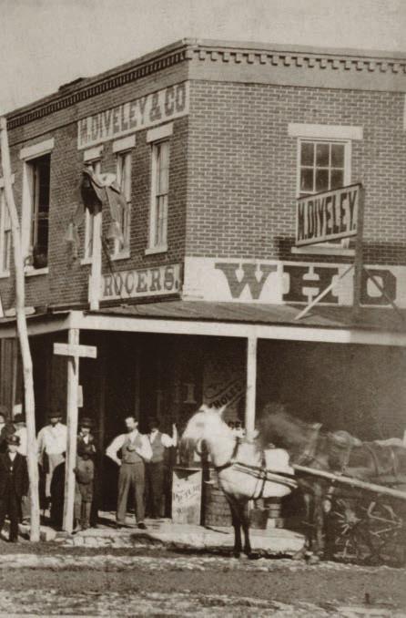 Grain companies, lumber dealers, grocers and dry goods wholesalers sprouted to serve the growing region; this 1867 photograph shows the southeast corner of Third and Main streets, looking east.
