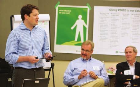 John W. Kemper was named president and chief operating officer of Commerce Bancshares in 2013. Below, Kemper, at left, leads a session in the company s culture-shaping initiative called Edge.