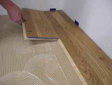 Lay the board in place in the groove and press down.
