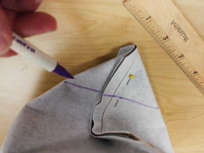 Pin in place and sew a 1/2" seam along the side and bottom edges only -- leave the top edge open for turning.