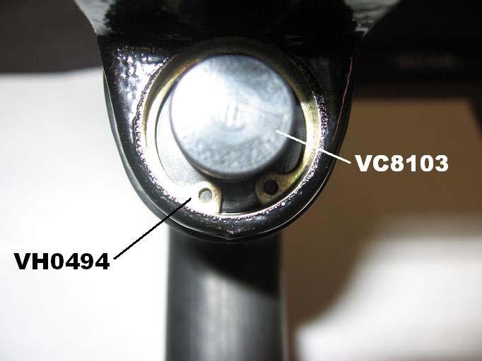5. Replace spring VH0506 onto end of valve rod VC8111. 6. Replace deflector VC8103 and hold in place with retaining ring VH0494. Make sure that retaining ring snaps into internal groove of body.