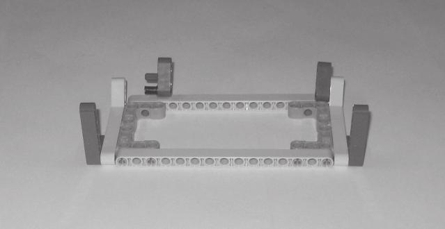 16. Figure 9.16 Step 3 Coect a 3M straight beam to the left side of the rear chassis usig a coector peg with frictio ad coector peg with frictio ad cross axle, 17.