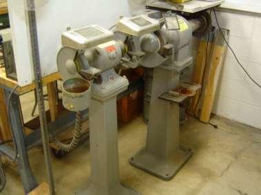 BENCH GRINDER: Stand to the side of the grinder, not in line with the wheels, when turning on the grinder and while the wheels are accelerating, as this is the most common time for a damaged wheel to