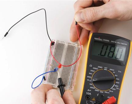 Using a Multimeter // Measuring Continuity Measuring continuity of the circuit excluding wire connected to ground, resistor and LED.