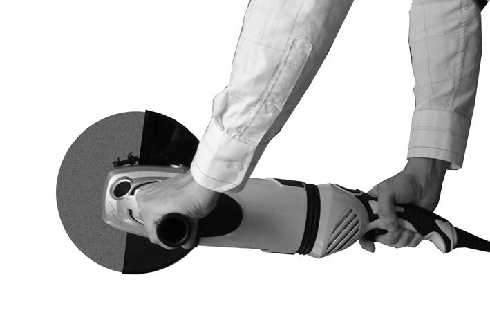 comfortable grip. 1. Hold the body of the angle grinder with one hand. 2.