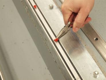 EMSEAL DFR-FP (DFR For Plaza Decks and Split Slabs) Install Data April, 2016, Page 10 of 21 STEP 18: Install Rubber Flashing Sheets Roll out flashing sheets along the