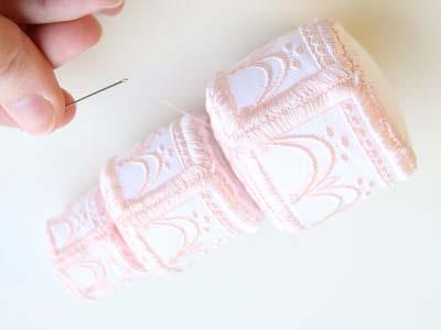 Finally, stack the tiers, and hand stitch or glue them together to create a