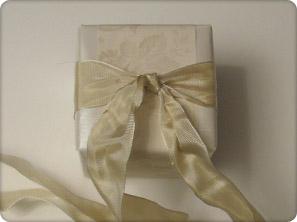 7. Using the ends, tie a bow on one side of the box