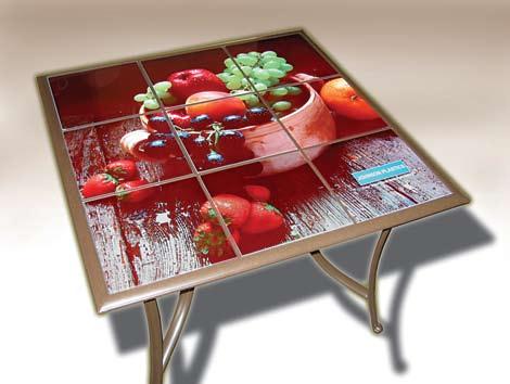 This table was finished with glass tiles from Premiere Finishing & Coating. murals sell for $80 to $100 a square foot, unmounted.
