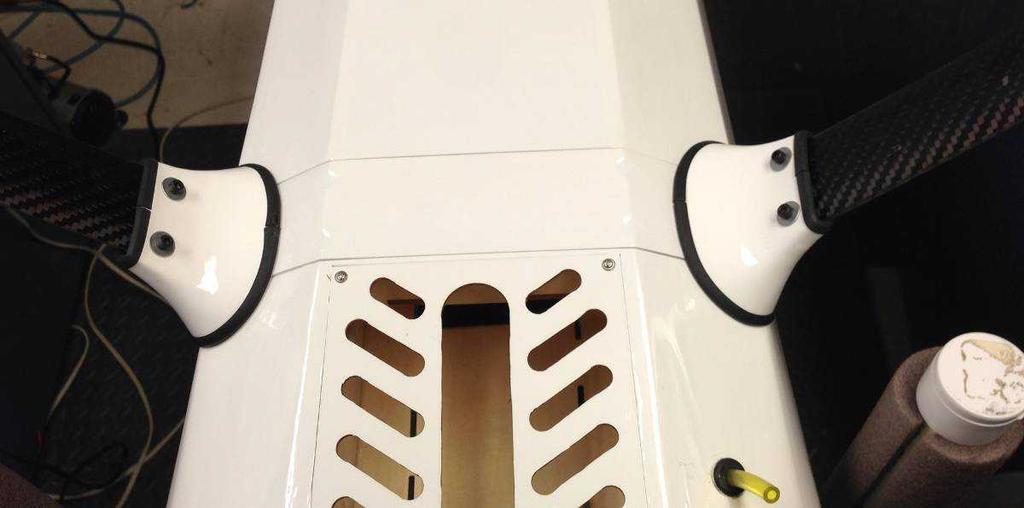 Attach the cover plate over the landing gear screws using epoxy glue or silicone adhesive.
