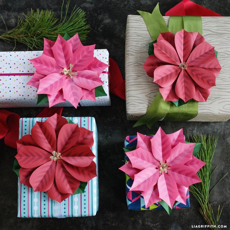 Metallic Paper Poinsettia Gift Topper As much as we love our floristic crepe paper poinsettias, we thought it would be best to also create a metallic paper option.