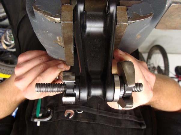 9. i) Press the first bearing in, with the nut sitting directly on the bearing. 10.
