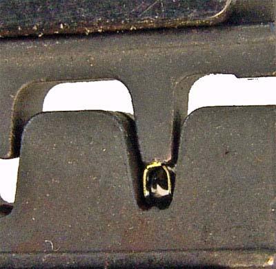You do NOT want to crimp the bulb. Bulb of the Crimp Pin The Clasp tabs should be pointing DOWN into the valley of the die.
