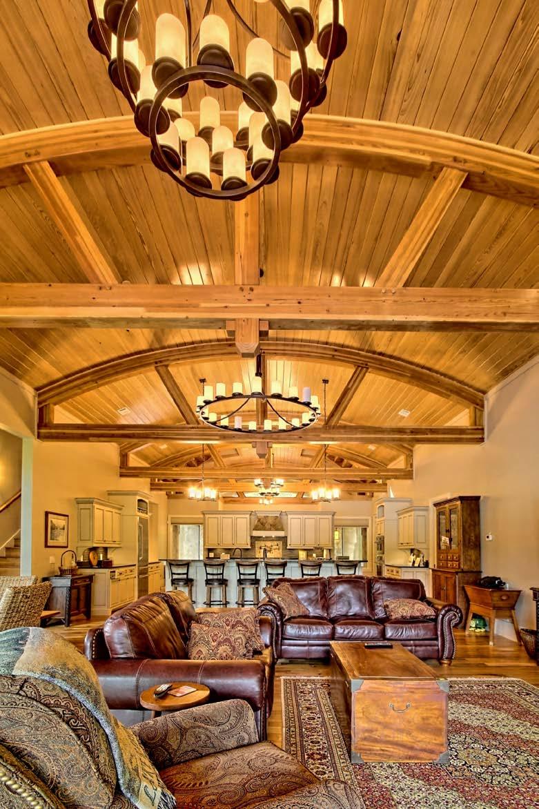 Lakefront Home The barrel vaulted ceiling built in this lakefront home in Georgia was created with custom glulam timber frame trusses.