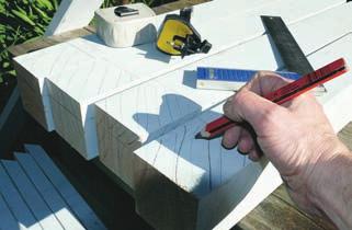 cutting the long rails and end-frame top rails with a mitre saw to 45º.