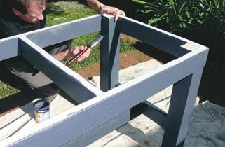 5Assemble the end frames Apply construction adhesive to the housing then position the end-frame top