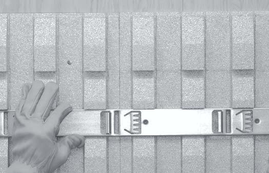 6 For small wall spans, position FULLBACK insulation with channel centered in space. Note: Use one strip placed into channel in 12" or less wall span.