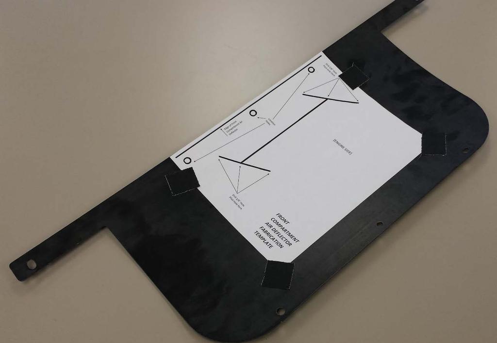 ) Place the corresponding template on the Front Compartment Air Deflector and secure to part
