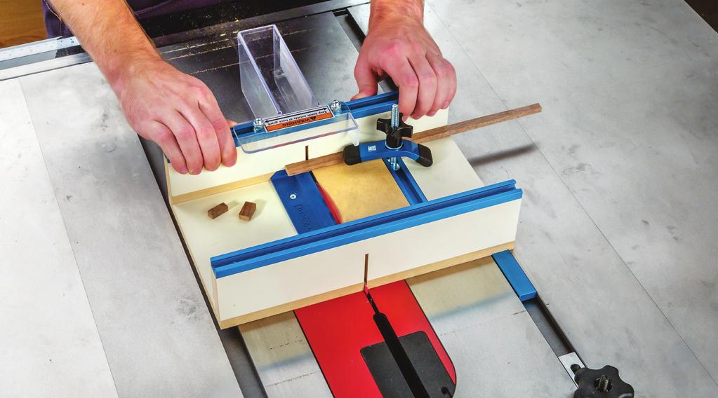 3. Pull the Sled Body (1) to the front of the saw and position your workpiece against the back fence, aligning your cut mark with the edge of the saw kerf.