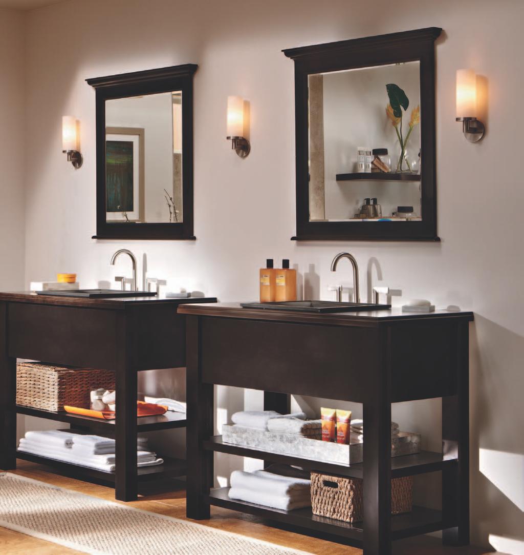 Twin vanities offer plenty of convenient storage, while a walk-in shower and deep soaking