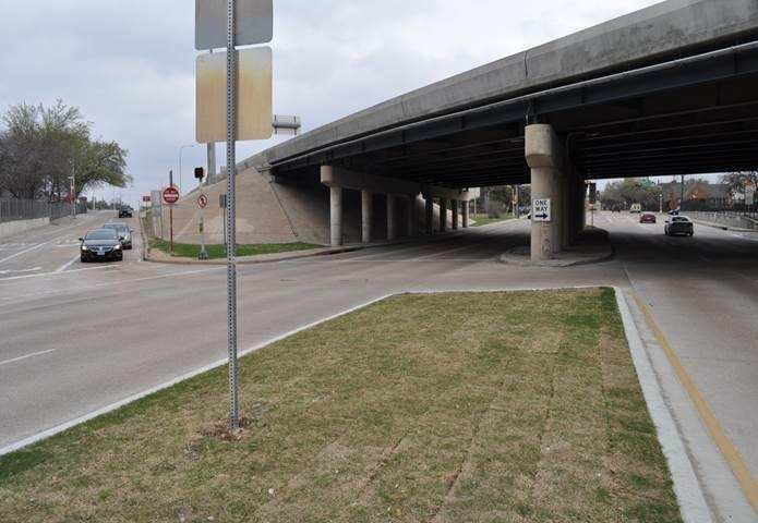 Application of raised median/median barrier for trumpet interchanges. Do not use raised medians to separate vehicles traveling in the same direction on exit ramps.