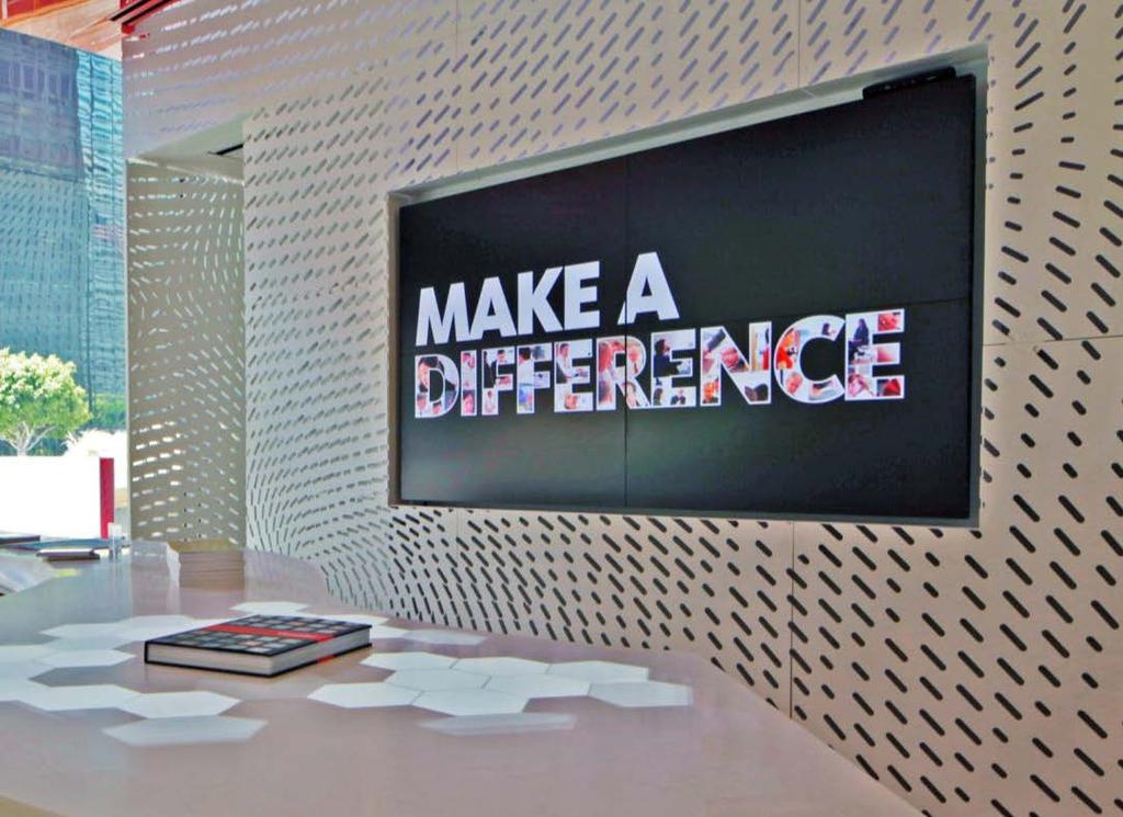 Corporate Gensler Los Angeles, California Mixing a large-format display with a gesture-based touch control (on the table)