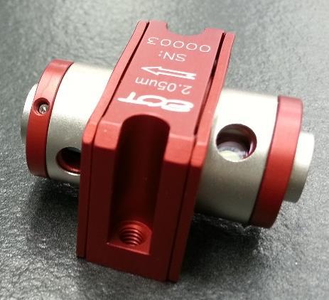 The Makros Series Optical Isolator Polarizer Dust Covers Figure 2: Overall view of a Makros Series Optical Isolator With the polarizer covers open, a polarizing beamsplitter cube ( PBSC ) can be seen