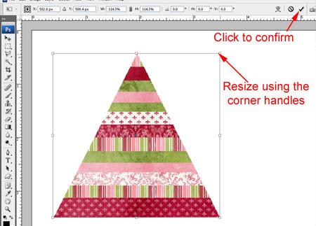 Drag the cursor upwards and click again at the center of the top of the striped layer, then drag downward to click at the bottom right corner. Use the rulers to help you make a symmetrical triangle.