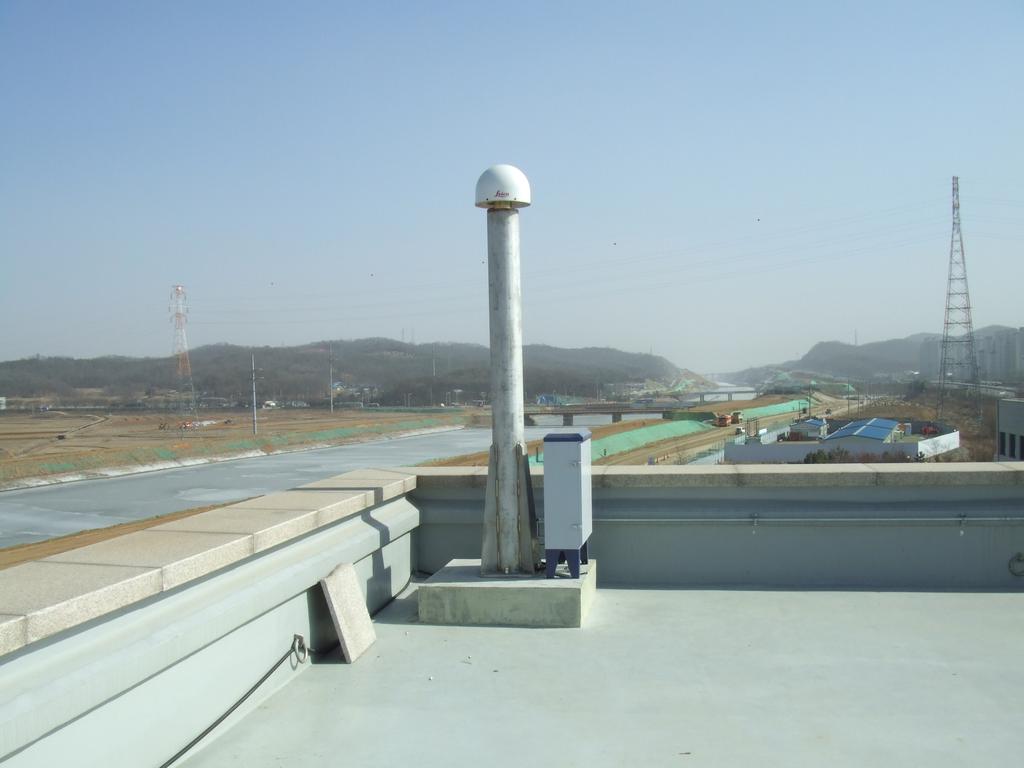 Fig 2: One of the GLONASS and GPS Reference station on the roof top of NAH office GLONASS AND GPS BRIDGE MONITORING SOLUTION The GLONASS and GPS Bridge monitoring system consists of GNSS receivers,
