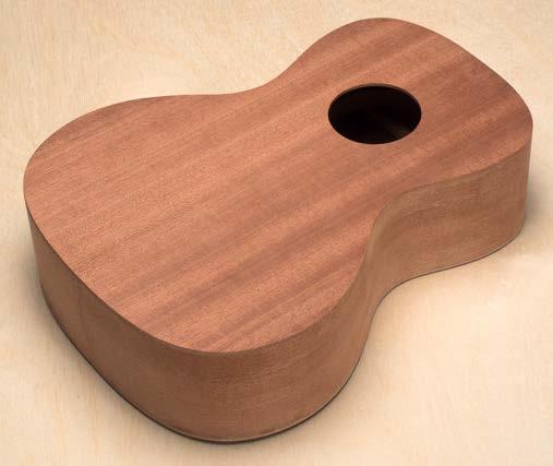 Just make the top and back edges flush with the sides. Don t cut upward against the grain. Sand until you have a smooth edge all around the uke.