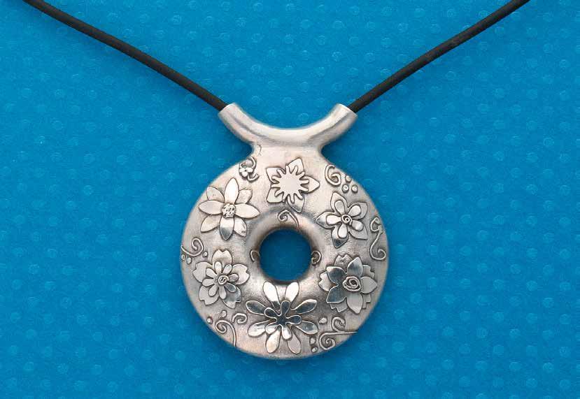 PROJECT INTERMEDIATE METAL CLAY Take a Crash Course in Metal Clay with this Appliquéd Bisque-bead Pendant Discover how to use four types of metal clay paper, paste, syringe, and lump to create a