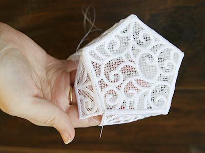 Make sure the wrong sides are touching, and hand sew the pieces together along the bottom edge.