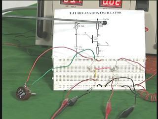 I want you to look at the UJT here and the two resistors and one variable resistor is here along with another series resistor and there is a capacitor.