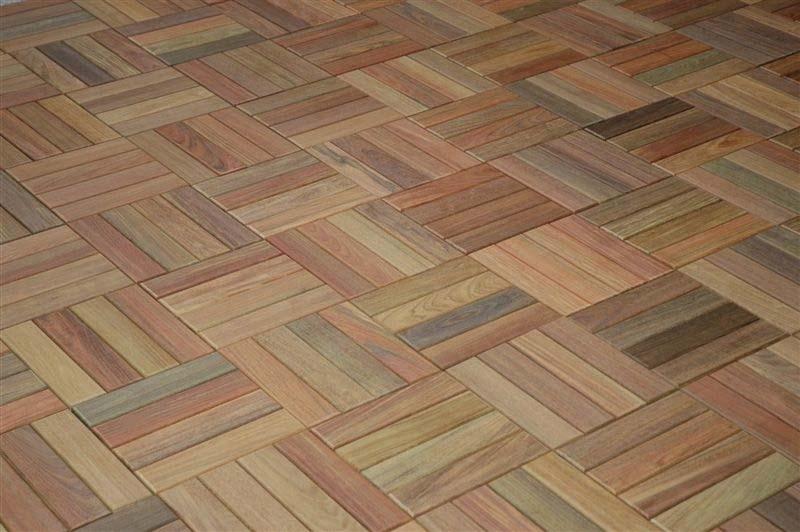 Ipe is often referred to as Brazilian Walnut. The wood is olive brown to dark brown in colour with reddish tints and distinctive light and dark marbling or striping.