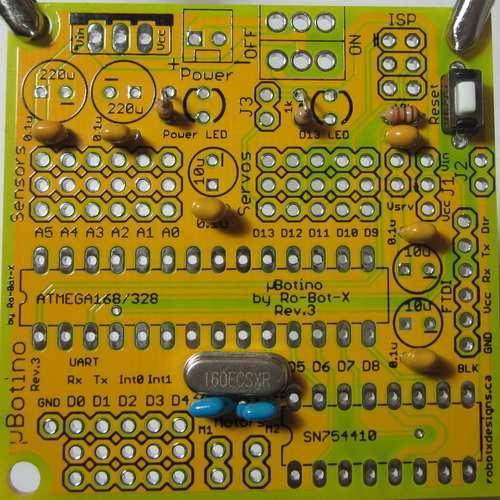 6. Insert the Reset button in its place, press it down until makes a click sound, turn the board upside down and solder.