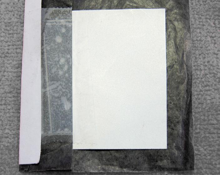Carbon paper transfer Prepare the transfer paper. Cut a piece of carbon or transfer paper slightly larger than your metal piece.