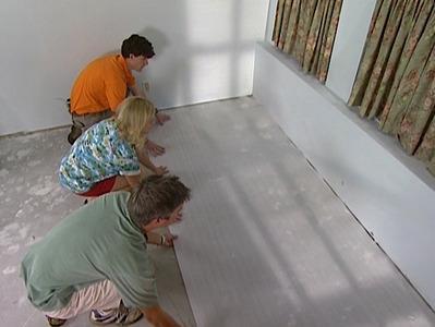 Step 2: Clean the Subfloor, Remove Base Molding Clean the subfloor to make sure it's free of any dirt and debris.