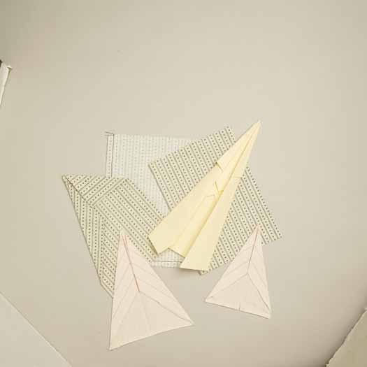This is subtle but can make a difference in the godet actually looking like an airplane! If your airplane skills are a bit rusty, you may want to refresh your memory with some paper folding first.