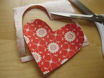 Use a marker to trace the paper heart (cut