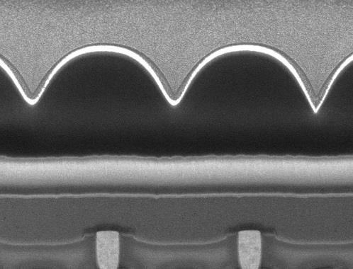 Microlens Anti-reflection layer Top electrode/ top contact QuantumFilm Bottom electrode Substrate Figure 1. Scanning electron microscope cross-section of the QuantumFilm stack with 1.