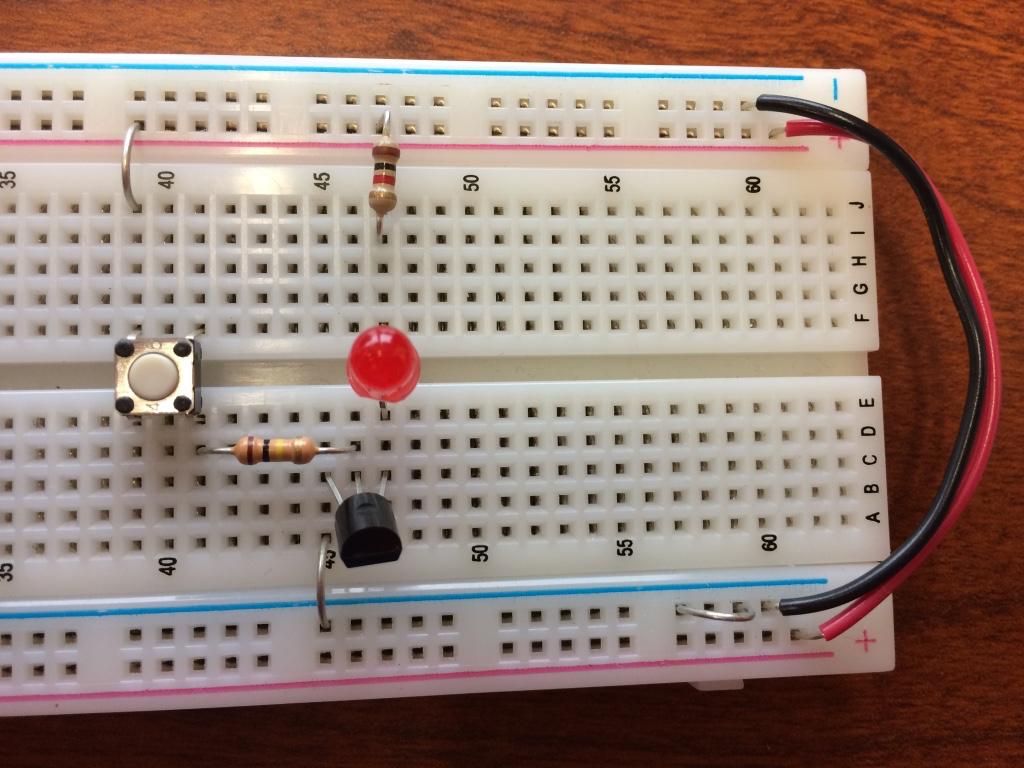 5 proper orientation by inserting it across the central divide of the breadboard (Figs.