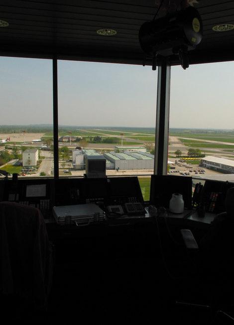 Fig. 10. Left three images: Differently exposed images from the interior of an airport tower. Right: combined image with high contrast in dark as well as bright regions.