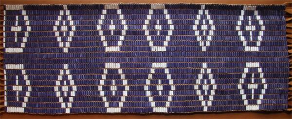 Algonquian Promise Belt (Est.) 18.0 inches. Width 3.0 inches. Rows: 167 long; 9 beads wide. Beaded Length: 28.5inches. Width: 3.6 inches. Length/fringe: 57.5 inches. 167 rows by 9 rows wide.