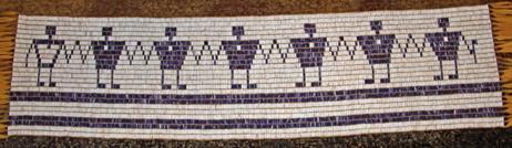 Wyandot Two Row Belt 425 columns by 25 wide Beaded Length: 44.3 inches. Width: 11.2 inches. Total length with fringe: 68.3 inches. 425 columns by 25 rows. Total: 6,625 beads.