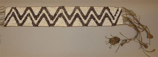 Iroquois Turtle Pouch Belt Beaded Length: 24.75 inches. Width: 4.25 inches. Beaded Length: 31.0 inches. Width: 7.2inches. Total length with fringe: 56.0 inches. 169 columns by 16 rows.