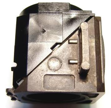 Apply gentle pressure to the cube halves during assembly to retain the Dichroic within the flanges of the spring clip.