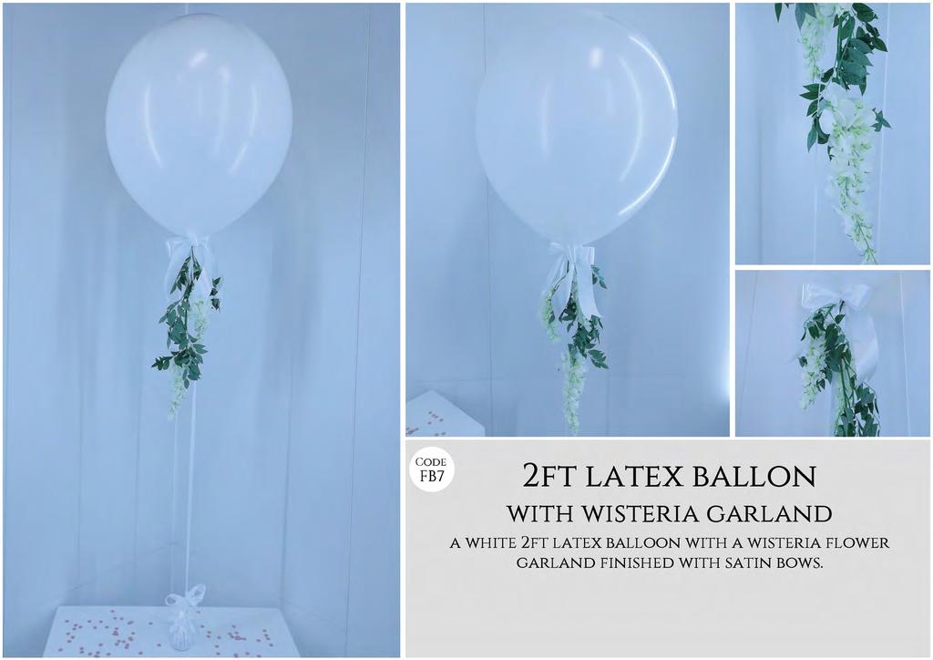 cfo:; 2FT LATEX BALLON WITH WISTERIA GARLAND A WHITE 2FT LATEX BALLOON WITH A