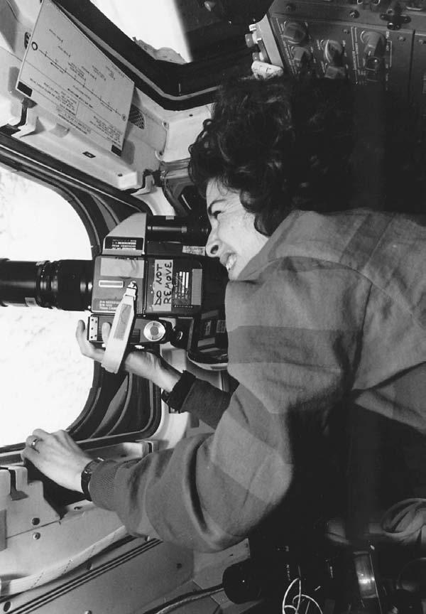Ellen Ochoa photographing one of Earth s oceans from aboard the Discovery space shuttle during her first mission in 1993.