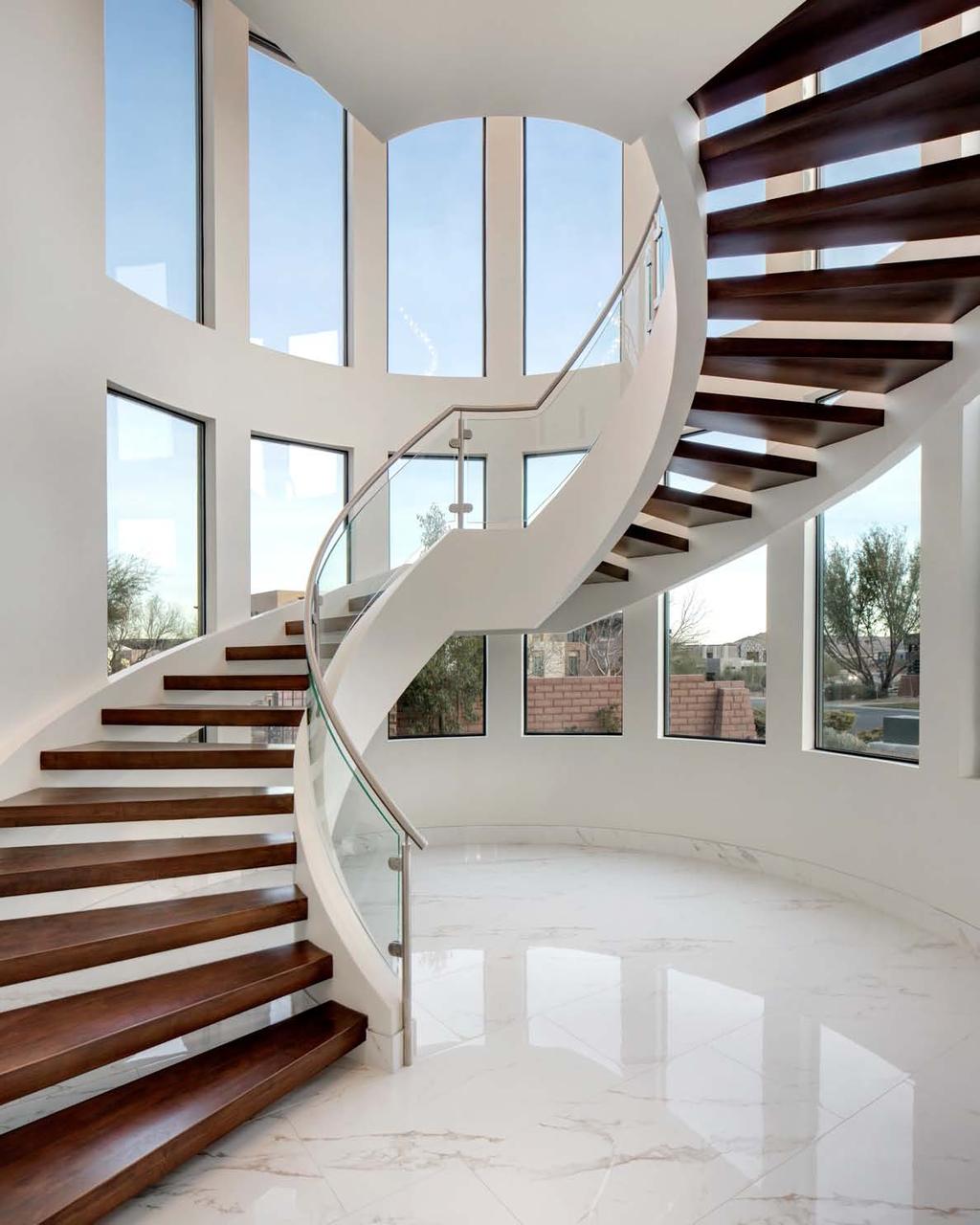 2018 StairCraft Awards Aesthetic value: This is a laminated free floating stairway with open risers and solid maple steps wrapped all sides.
